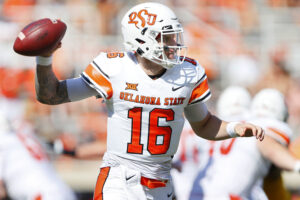 No. 15 Oklahoma State escapes with another victory, Cowboys beat West Virginia 27-13